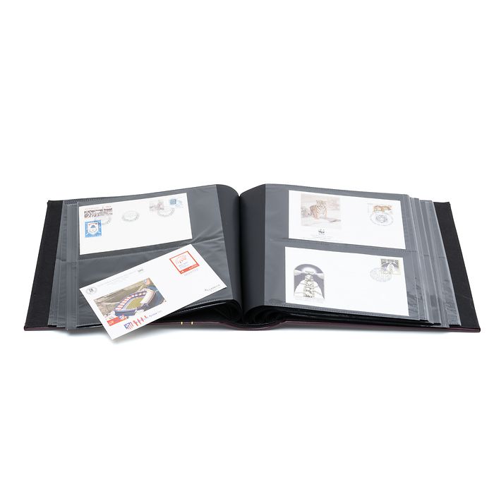 Öppet Leuchtturm FDC-album som visar transparenta fickor för vykort i C6-format